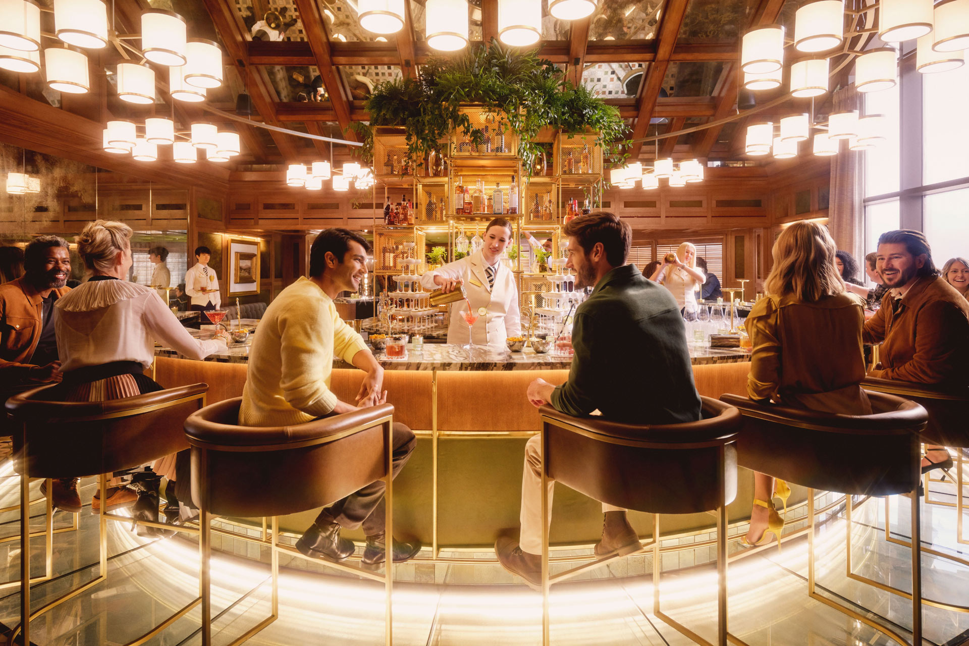 Open gallery overlay: people sitting at the circle bar chatting