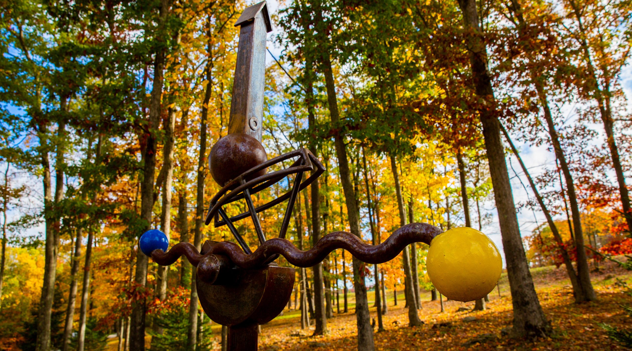 outdoor sculpture among trees at Nemacolin resort
