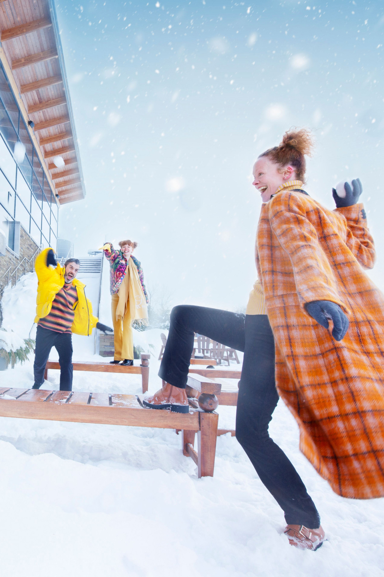 Open gallery overlay: a woman throwing a snow ball